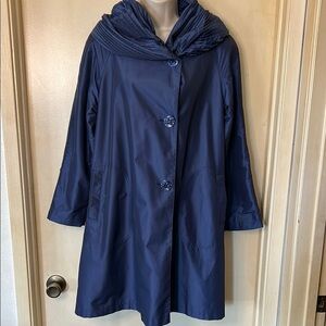 Gallery  Blue Rain Coat with Dramatic Accordion Hood and Water-Resistant Fabric